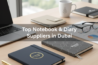 "Create a high-quality, professional corporate-themed image featuring PU leather notebooks, hardcover diaries, and spiral notebooks arranged elegantly on a modern office desk. Include subtle corporate branding on notebooks such as embossed logos or foil stamping. Add lifestyle props like pens, laptops, coffee cups, and business papers to make the scene realistic. Ensure bright, natural lighting, sharp focus, and premium composition. Include the title text 'Top Notebook & Diary Suppliers in Dubai' in the center of the image, visible from each side with balanced typography, blending naturally with the scene. Style should be modern, corporate, and visually appealing, suitable for a business article on corporate gifts. Output in landscape format 1200x628 px. Alt text ideas: 'PU leather notebook with corporate logo Dubai', 'spiral notebook for corporate giveaways Dubai', 'executive hardcover diary branding Dubai'."